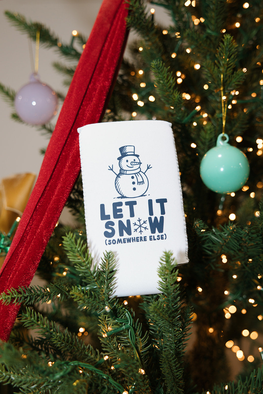 Let It Snow Somewhere Else White Slim Can Cooler